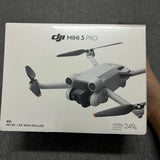 DJI Mini 3 Pro 4K drone on retail box, foldable arms and camera gimbal