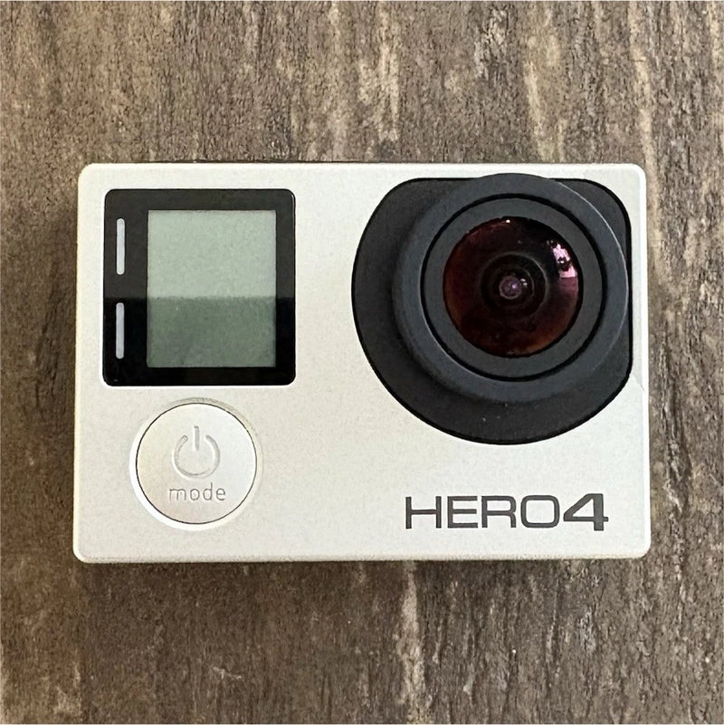 GoPro HERO4 action camera with front touchscreen and lens in white and black
