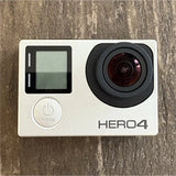 GoPro HERO4 action camera with front touchscreen and lens in white and black