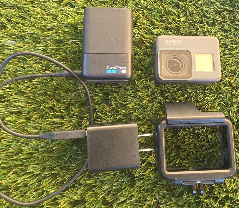 GoPro Hero 5 Black action camera with dual battery charger, two batteries and cables