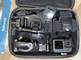 GoPro HERO 10 BLACK action camera in a hard case with mounts and accessories
