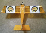 RC airplane short kit model with yellow wing, flame decals, and center landing stand