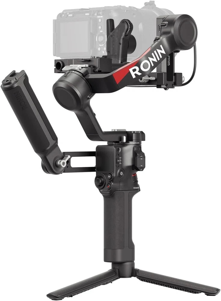 DJI RS 4 gimbal stabilizer with mounted camera, dark handle, and tripod feet