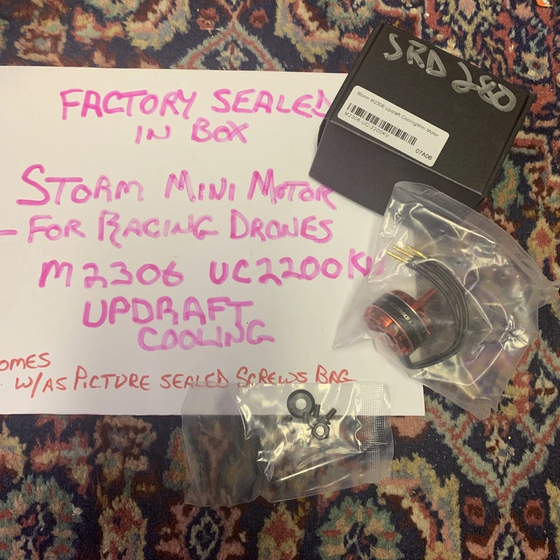 Mini FPV racing drone motor in sealed plastic bag, black with red connector wires