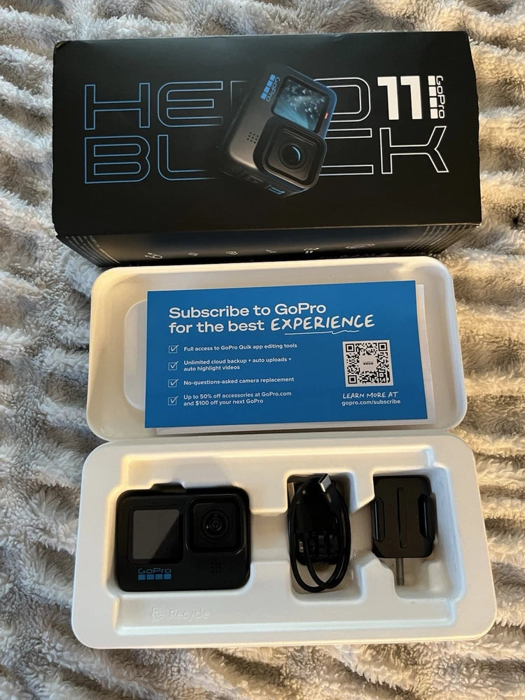GoPro HERO11 Black action camera with accessories in open storage case