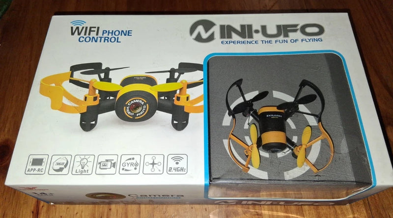 Mini UFO drone packaging showing yellow and black quadcopter with camera