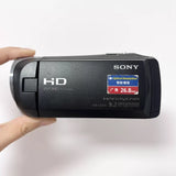 Black Sony camcorder with HD 9.2MP zoom lens, front view