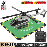 6-axis gyro RC helicopter with black blades, on green mat, and 2.4GHz remote control