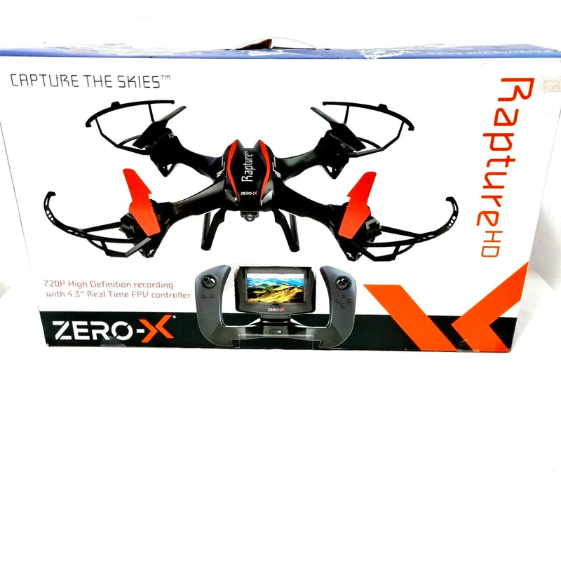 FPV quadcopter drone in retail box, black with orange accents