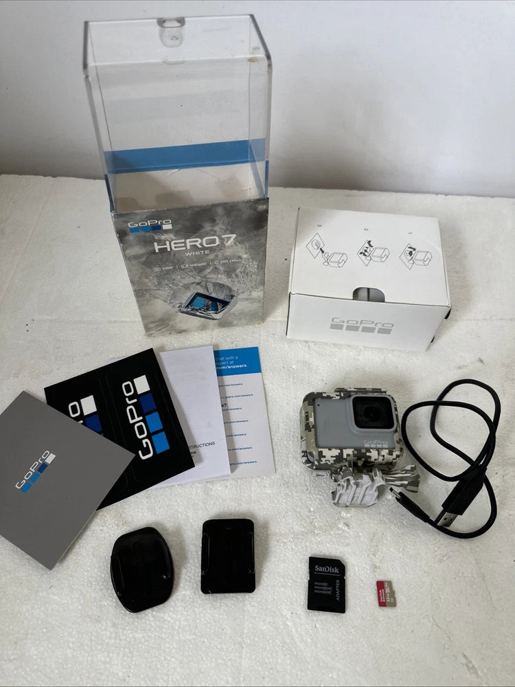 White GoPro Hero7 action camera kit with case, mounts, charger, and small accessories