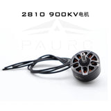 Brushless FPV drone motor with wire leads, round housing, and orange stator slots