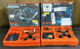 Video streaming drone set in box with black quadcopter and remote transmitter, orange packaging