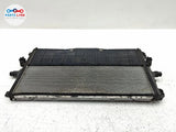 Battery coolant radiator assembly with metal fins and black frame