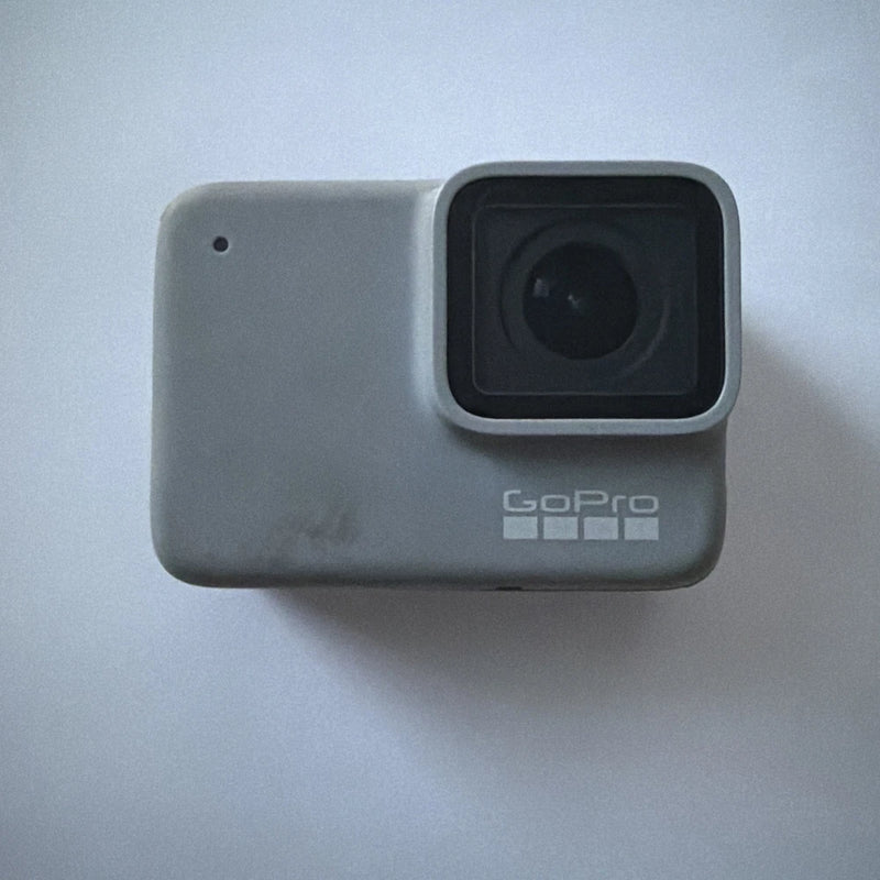 White GoPro action camera body with front lens and GoPro logo