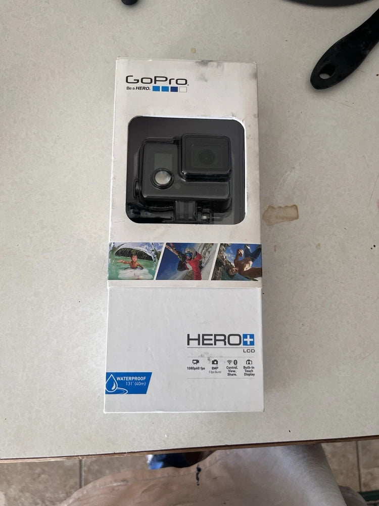 GoPro HERO+ action camera in waterproof retail box with accessory housing