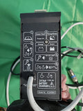Black 24V battery charger with indicator icons and attached AC power cable connectors