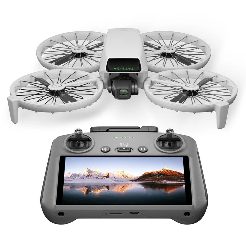 Foldable gray quadcopter drone with camera and gray RC remote controller with screen