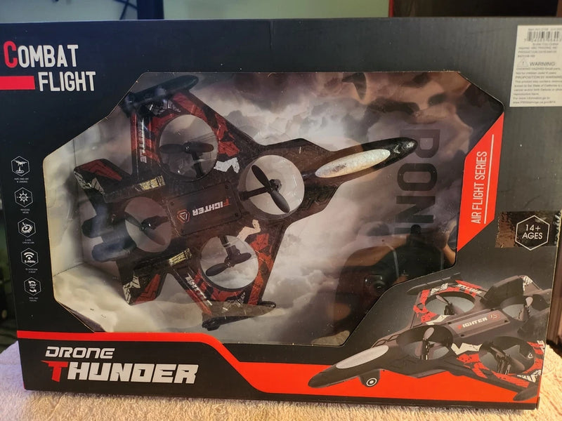 Toy combat flight drone in retail box, red and black printed design