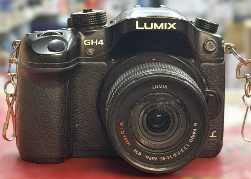 LUMIX DMC-GH4 Body, 2 Panasonic 14- 45m Lens camera and lens only