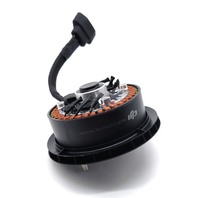 Black drone motor accessory with wiring and connected cable