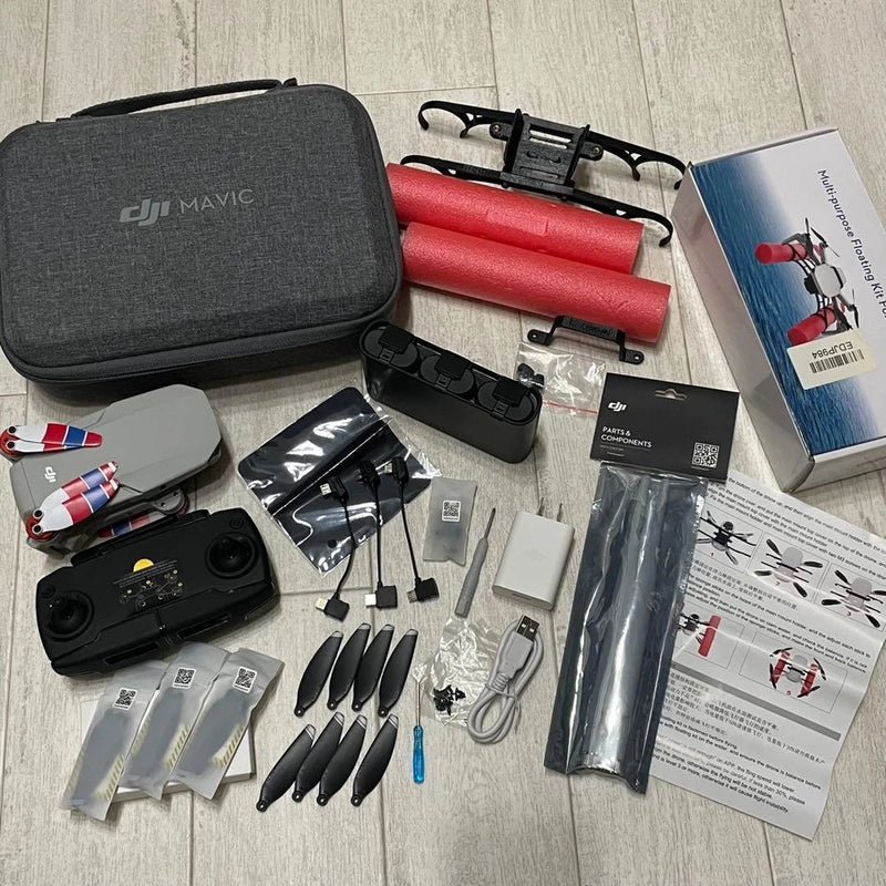DJI Mavic Mini drone kit with hard case, drone, propellers, batteries, cables, manuals