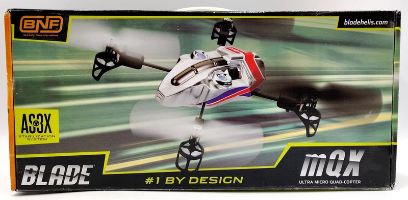 RC micro quadcopter drone kit in retail box, white body with red accents