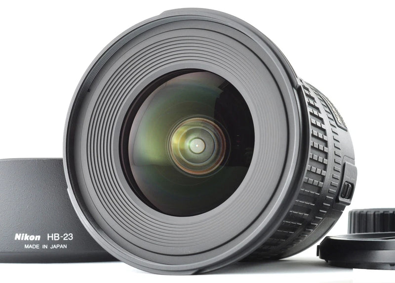 Nikon AF-S DX 10-24mm ultra wide angle zoom lens with lens hood and cap