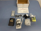 Air sampler pump kit with spare battery, cables, and accessories in box
