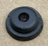 Round black rubber battery box mounting grommet with central hole