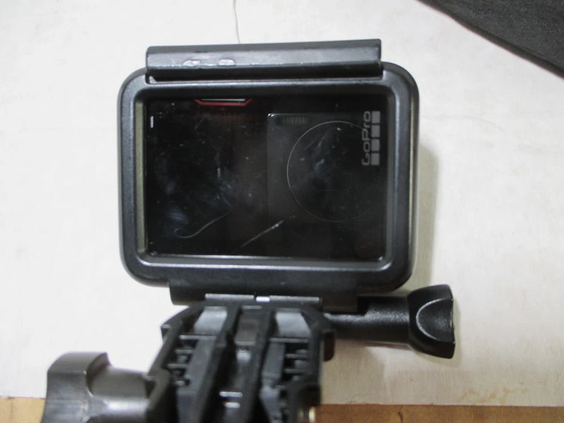 GoPro HERO7 action camera in black waterproof housing with front lens and open screen