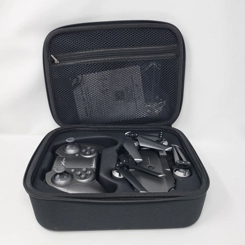 Black hard case with controller and foldable camera drone parts inside
