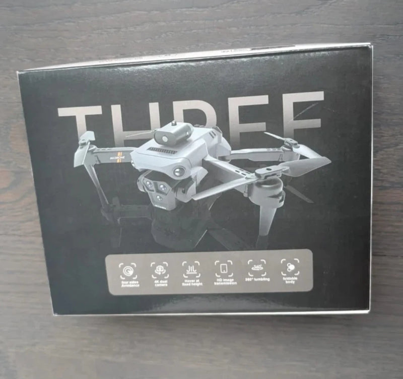 Foldable quadcopter drone with dual cameras on product box