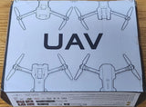 Foldable quadcopter drone box with UAV text and dual-camera illustration