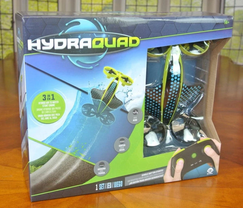 HydraQuad stunt hovercraft drone toy in retail package, green and black controller visible