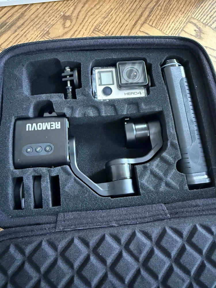 GoPro HERO4 action camera and gimbal kit in molded case with mounts and accessories