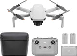 DJI Mini 2 SE drone kit with controller, 3 batteries, and black carrying bag