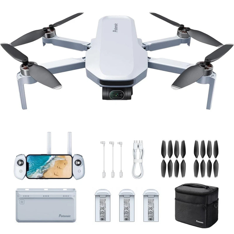 White quadcopter drone with camera, four foldable propellers and included accessories.