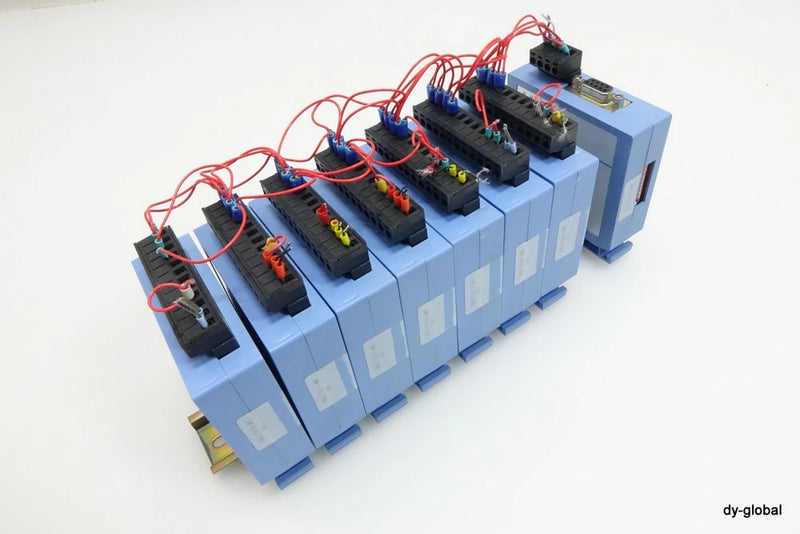 Blue electronic converter circuit board with black IC sockets and red/black wiring harness