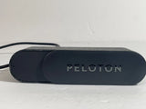 Peloton Guide camera pod with PELOTON logo on dark casing