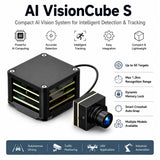 Black AI vision cube with dual side slots and attached camera module with cable