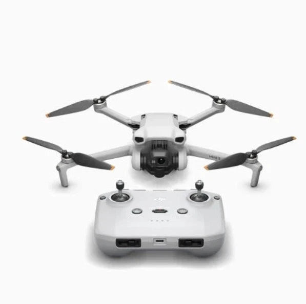 DJI Mini 3 drone with four propellers and camera gimbal, plus white controller