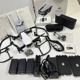 DJI Mavic Air Fly More Combo drone kit with controller, batteries, cables, manuals