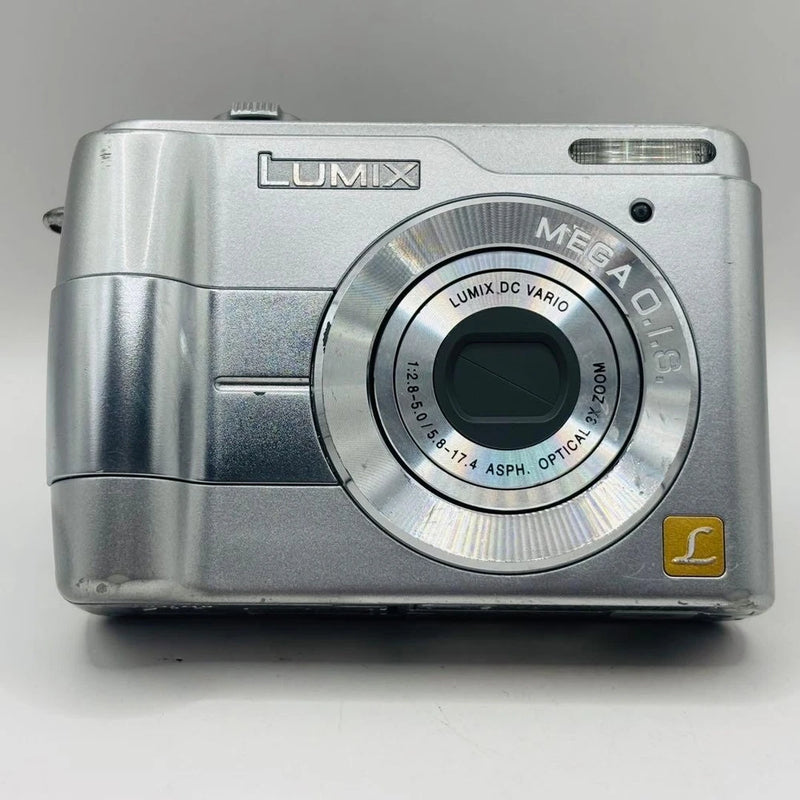 Silver Panasonic LUMIX compact digital camera with front lens and built-in flash