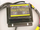 Dual Pro marine battery charger with yellow control label and attached cables