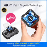 Blue and black mini folding quadcopter drone with camera, held in hand with controller