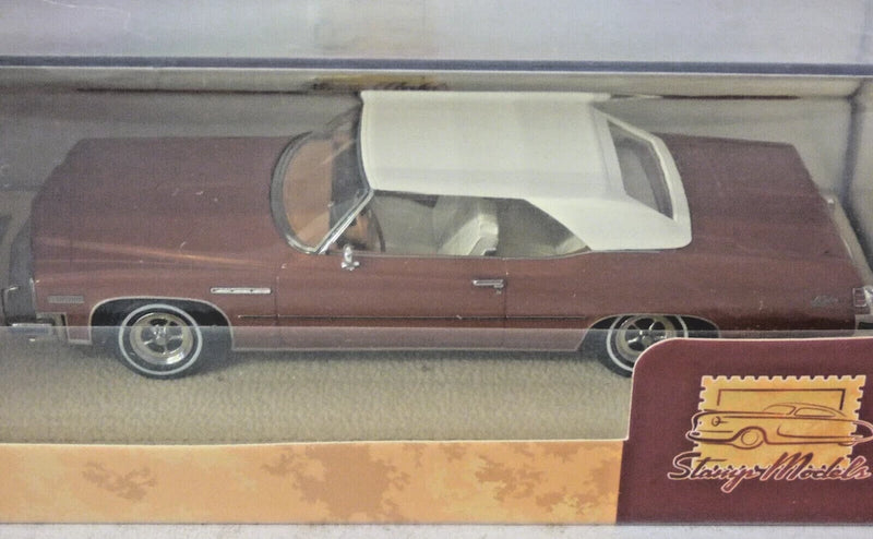 Brown 1975 Buick La Sabre Custom convertible die-cast model car, 1:43 scale