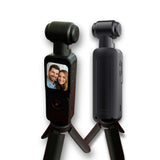 Handheld 4K action camera with front screen and black tripod stand