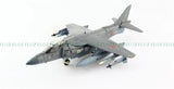 Gray AV-8B Harrier II scale plane model, front 3/4 view with wings and nose.