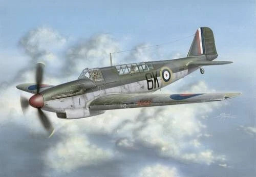 Green and gray WWII fighter aircraft model with roundel and propeller