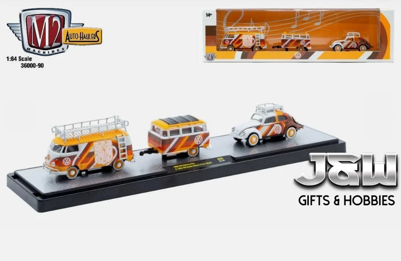 Die-cast VW delivery van and Beetle model set on black display base, orange and white